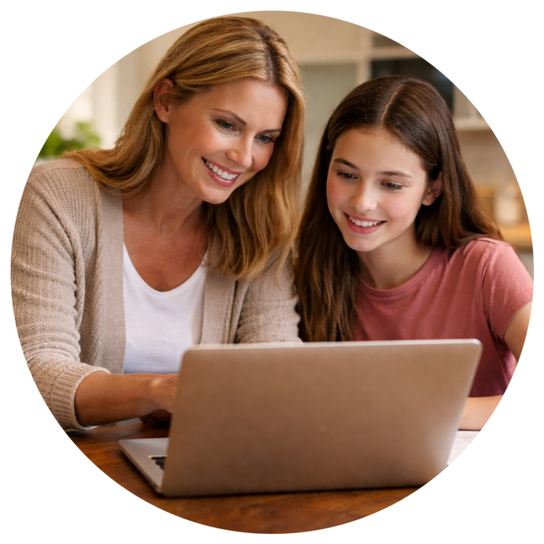 Student Registration – Scholarship Updates Mother and daughter registering for scholarship updates on a laptop